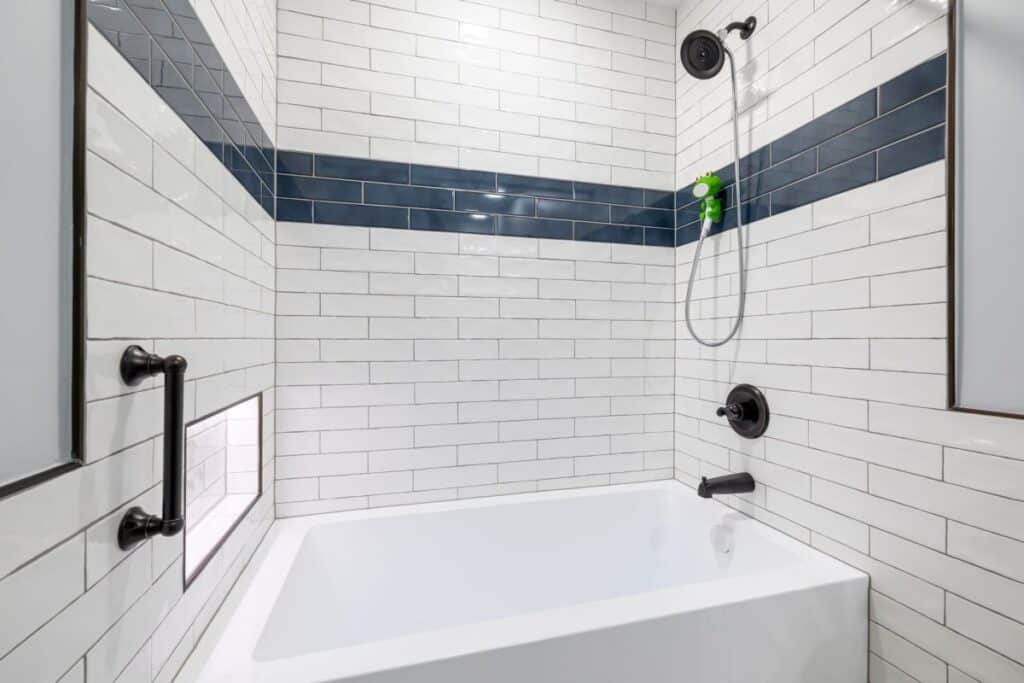 Aging-in-place bathroom renovation with grab bars and walk-in shower in Hurst TX home