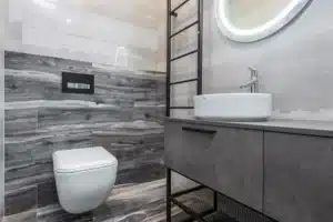 Modern bathroom remodel with double vanity and walk-in shower adding value to Hurst TX home