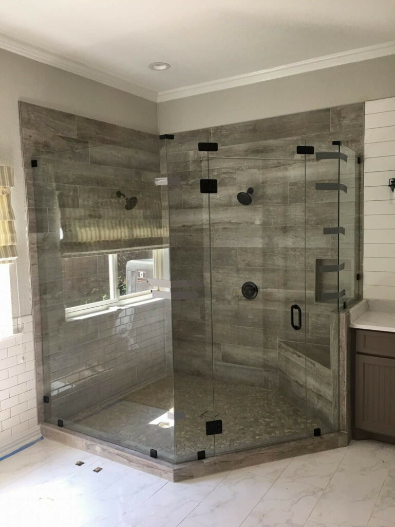 custom corner shower with glass frame