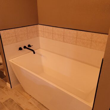 sleek tub installed in bathroom remodel