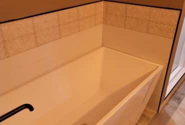rectangular tub installed in bathroom