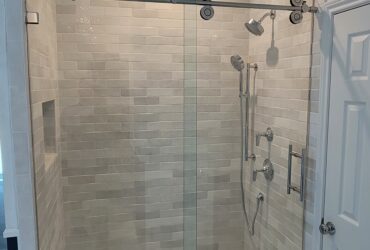 stand up shower with glass frameless doors