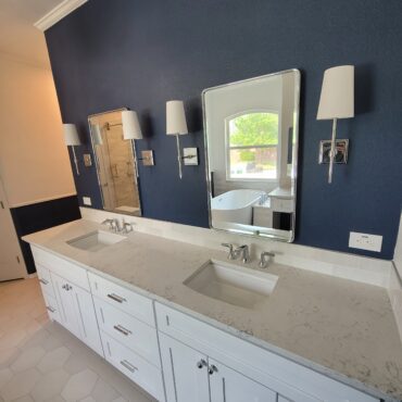 dual sink in bathroom remodel blue paint on walls