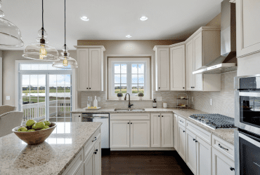 New kitchen with light colored cabinets