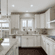 New kitchen with light colored cabinets