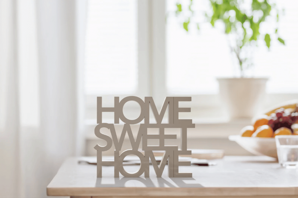 Home Remodeling stats: home sweet home sign sitting on kitchen counter