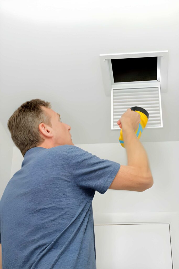 Homeowner enjoying fresh indoor air after air duct cleaning service in South Arlington TX