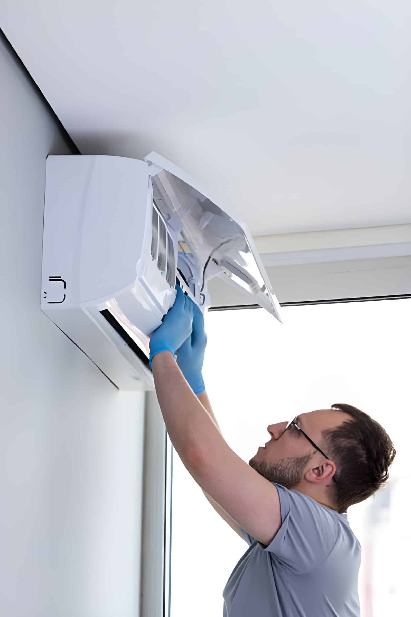 HVAC technician performing AC repair services on residential unit in Arlington