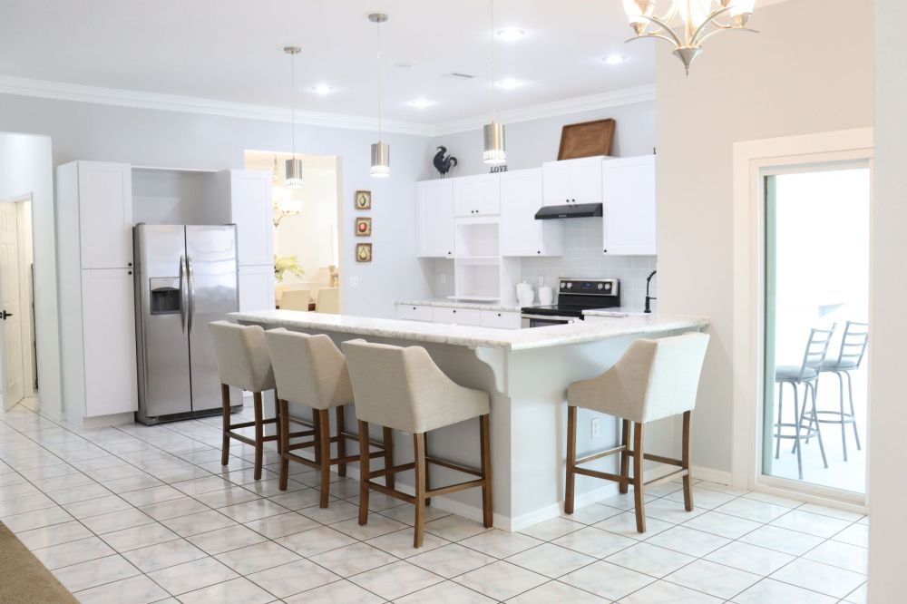 Large kitchen island with seating in an open-layout home remodel in Arlington Texas