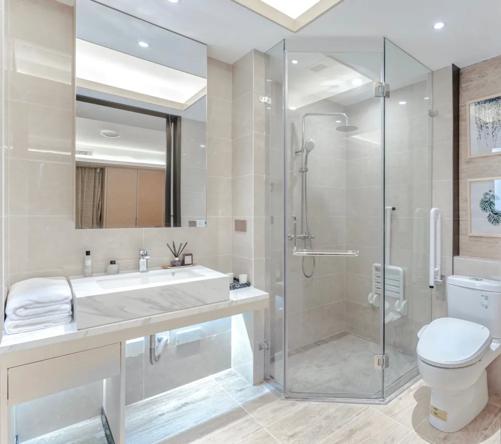 Modern zero-threshold curbless shower entry for wheelchair and walker access