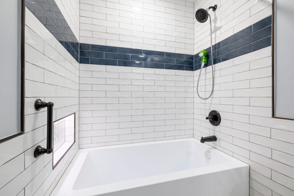 Aging-in-place bathroom renovation with grab bars and walk-in shower in Hurst TX home