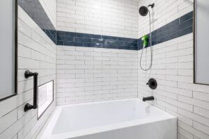Aging-in-place bathroom renovation with grab bars and walk-in shower in Hurst TX home
