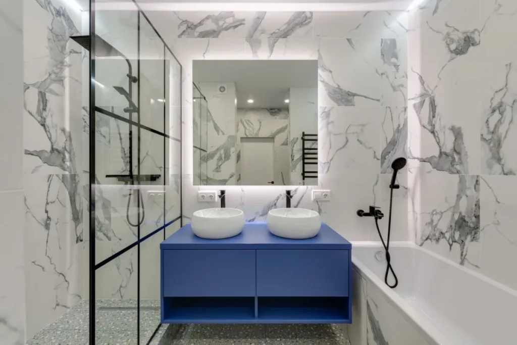 Freshly remodeled bathroom with walk-in shower and modern vanity in Arlington TX home