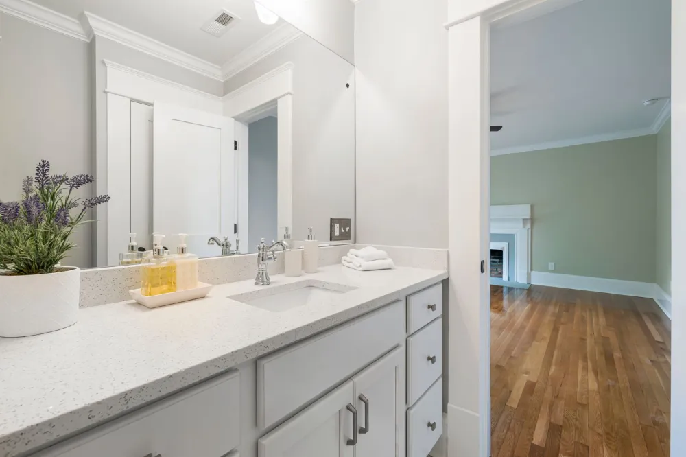 New quartz countertop double vanity installed in a remodeled Arlington Texas bathroom