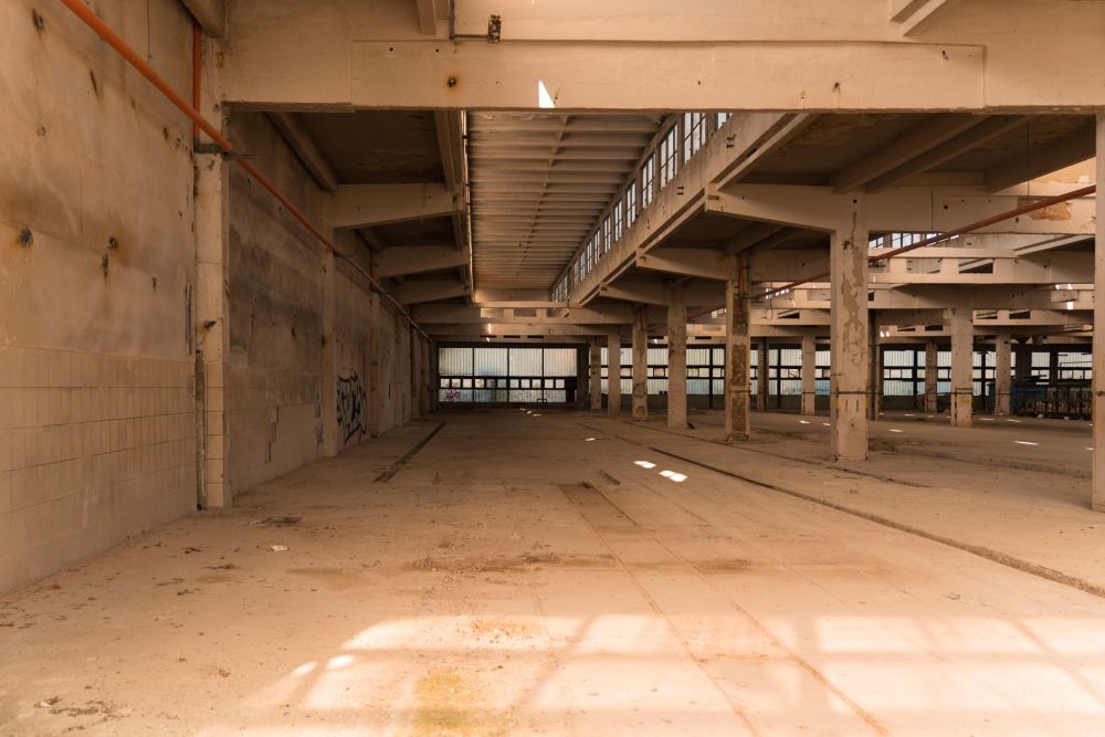 Empty commercial shell space awaiting retail finish-out construction in Arlington Texas