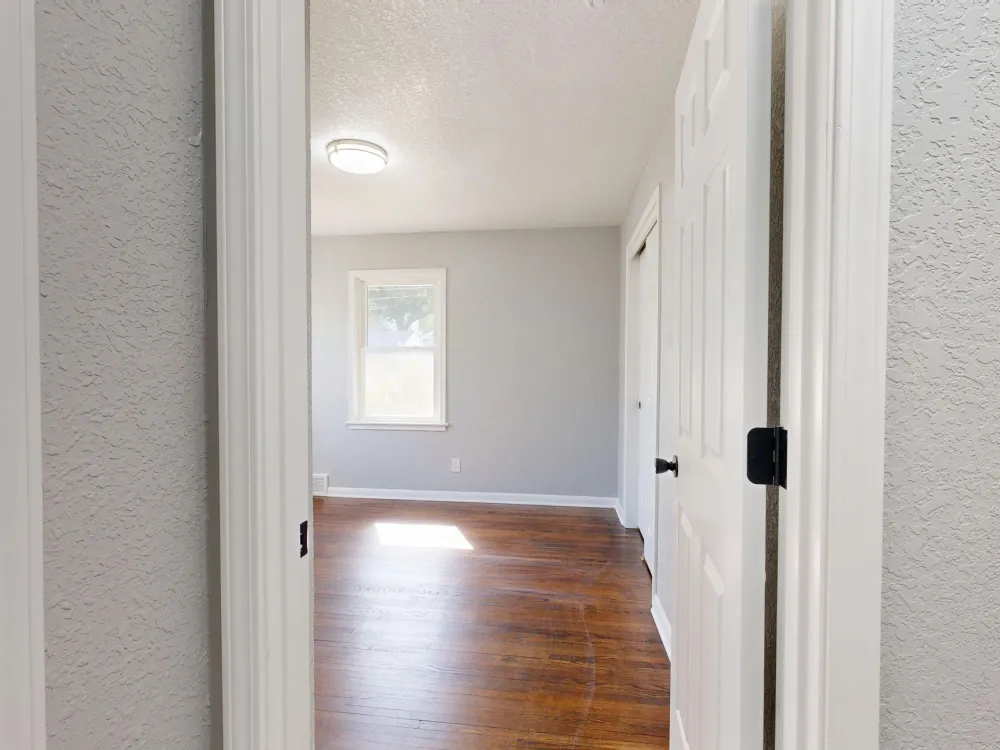 Open-plan living area with fresh neutral interior paint after a whole-home update in Arlington TX