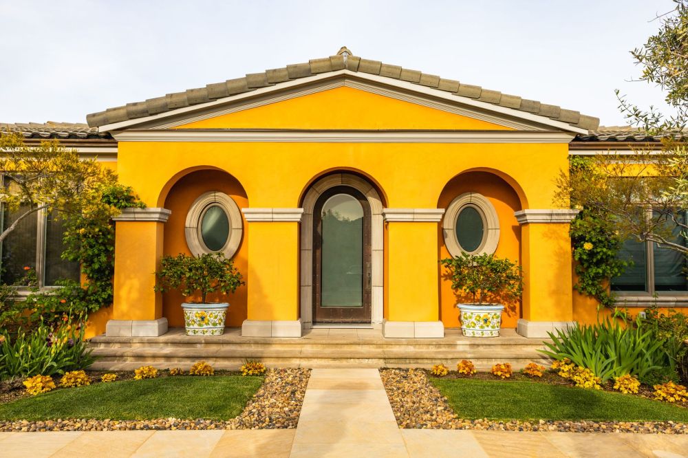 Newly painted home exterior improving curb appeal for a Bedford Texas homeowner