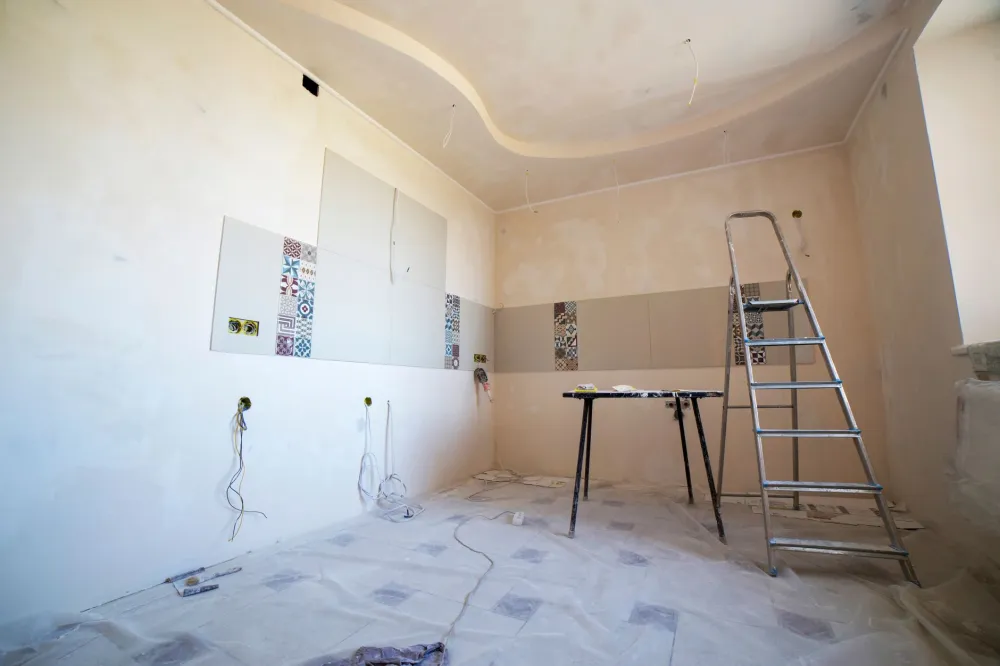 Remodeling contractor reviewing investment property plans with Arlington TX landlord