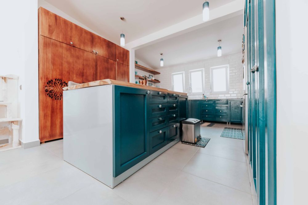 Kitchen island with deep drawers and built-in storage for family home functionality