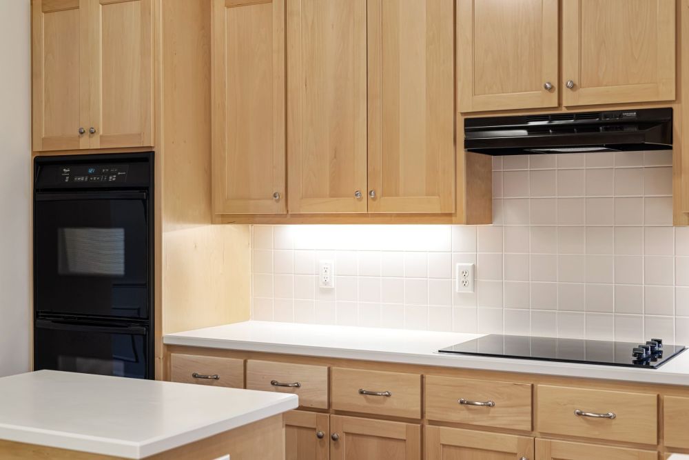 Updated kitchen cabinetry with modern hardware in a Hurst TX home renovation