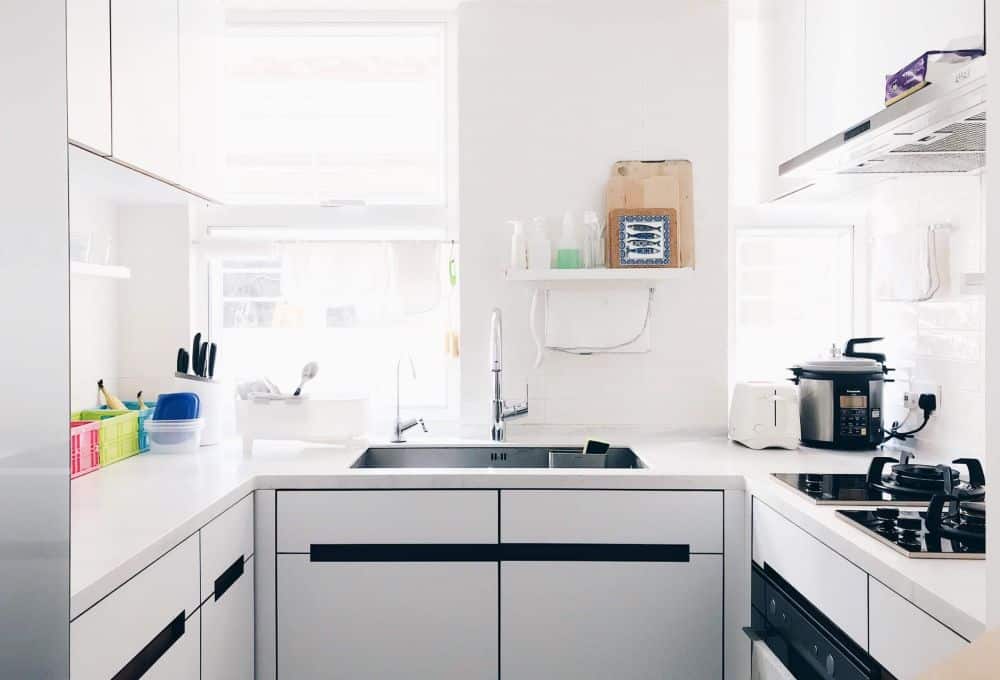Built-in smart appliances and deep drawer storage in a newly remodeled kitchen