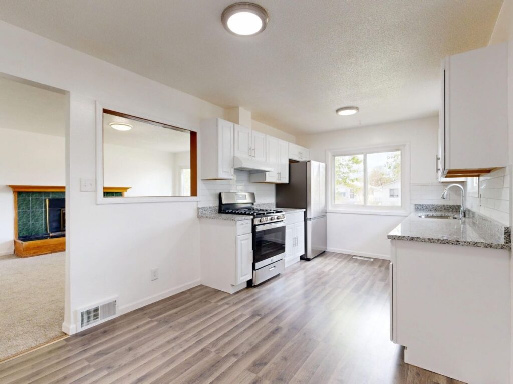 Bright modern kitchen remodel with quartz countertops and custom cabinetry in Arlington TX home