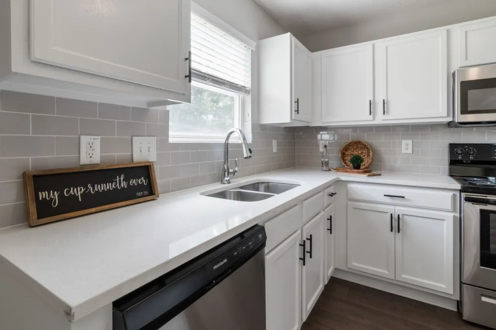 New white shaker cabinets installed during kitchen remodeling project in Hurst Texas