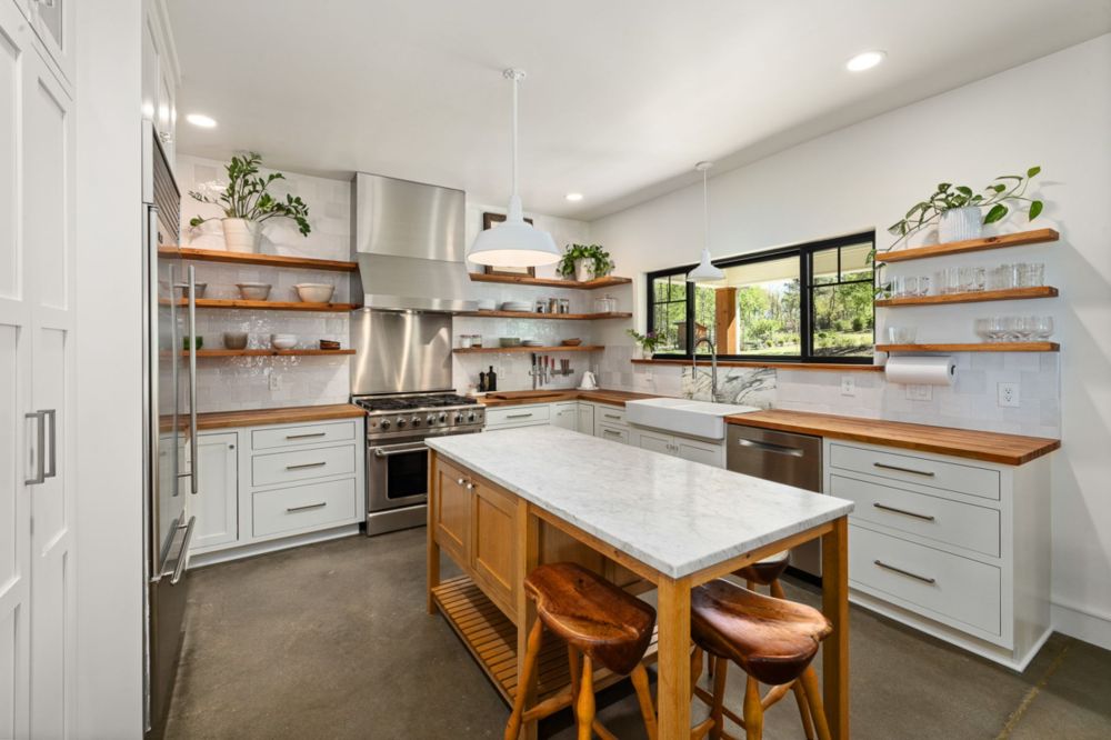 Kitchen renovation showing mixed open shelving and closed cabinets in a DFW home