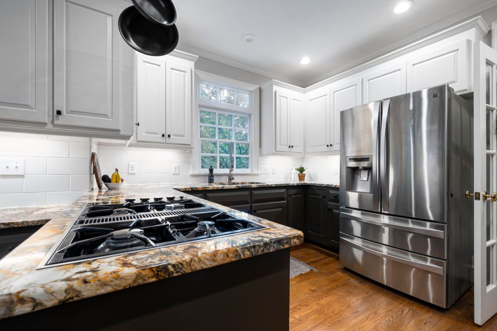 Ultra-dark kitchen cabinets that designers say can hurt home resale value