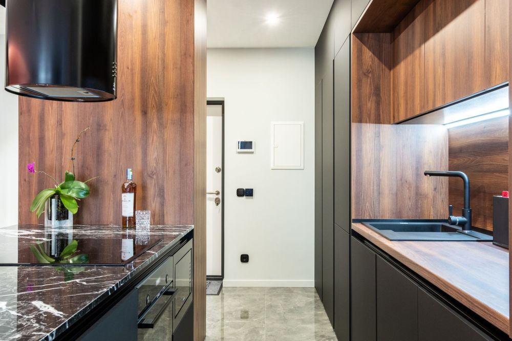 Quartz and granite countertop samples compared for kitchen remodeling decisions