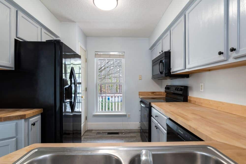 Refreshed open-concept kitchen with neutral finishes ready for DFW home sale