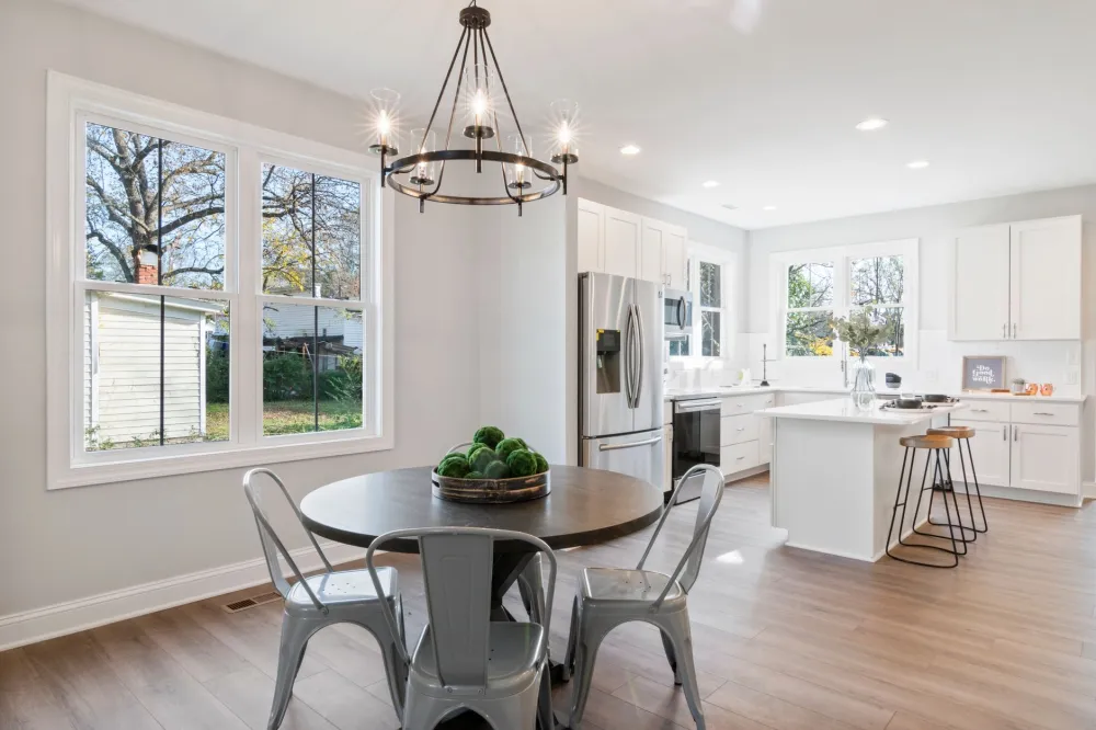 Finished open-concept kitchen and dining area after a full kitchen remodeling project in Bedford TX