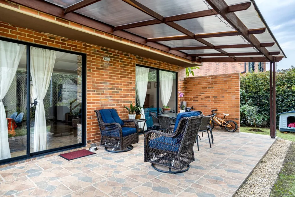 Covered patio outdoor living space remodel in Arlington TX backyard
