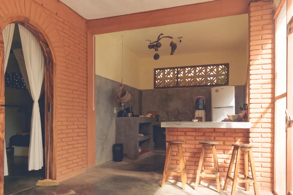 Outdoor kitchen with concrete countertop built during patio remodeling project
