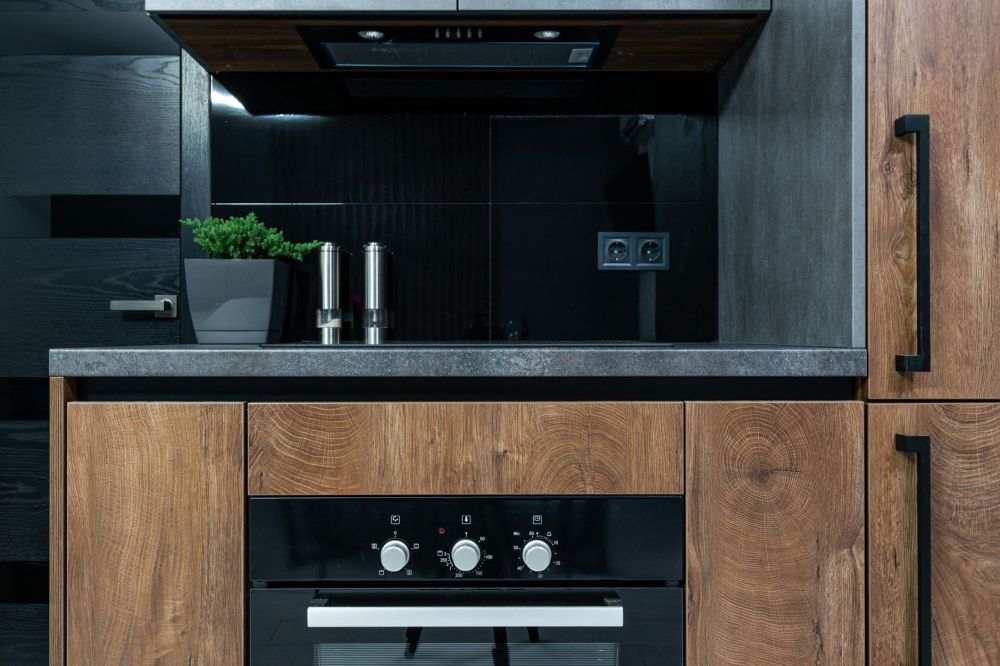 Shaker style kitchen cabinets with brushed nickel hardware in a remodeled Arlington Texas kitchen