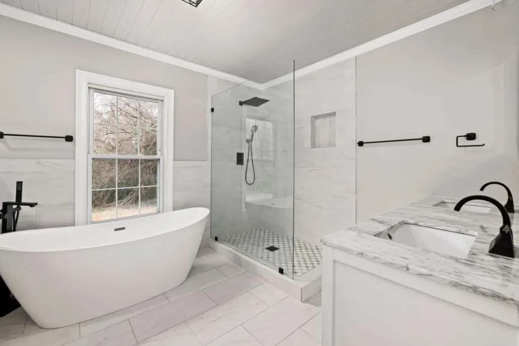 Freshly remodeled bathroom with walk-in shower and modern vanity in Arlington TX home