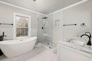 Freshly remodeled bathroom with walk-in shower and modern vanity in Arlington TX home
