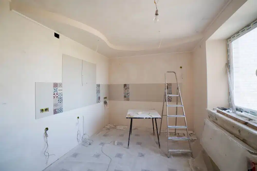 New drywall and luxury vinyl plank flooring installed in commercial office space