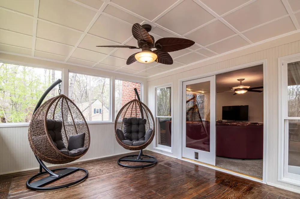 Outdoor ceiling fan installed on covered patio helping cool Texas summer heat