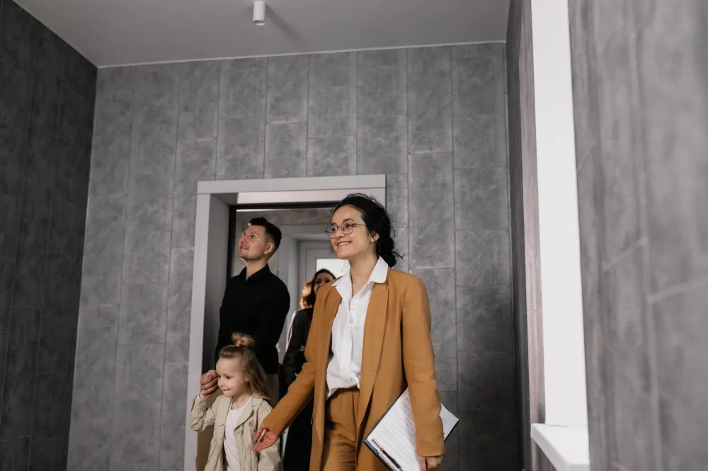 Investor and contractor reviewing punch list during final walkthrough of renovated flip home