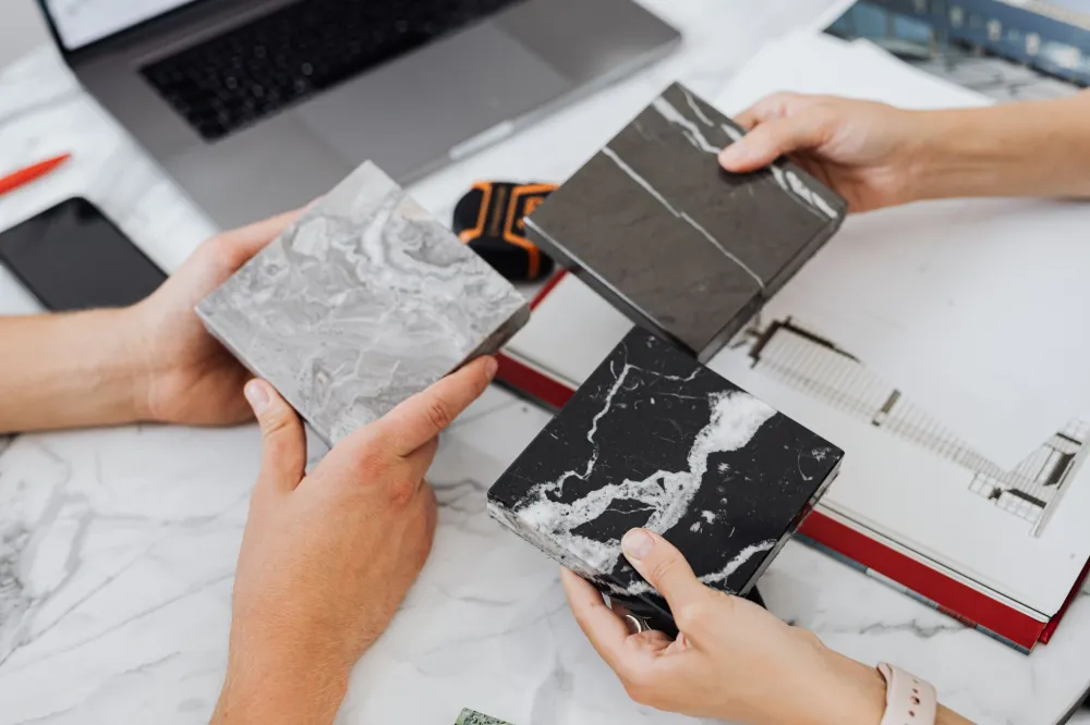 Side-by-side flooring material samples for a DFW home improvement decision