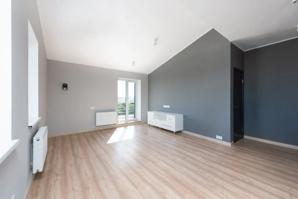 Freshly renovated Arlington TX living room with new flooring and interior paint