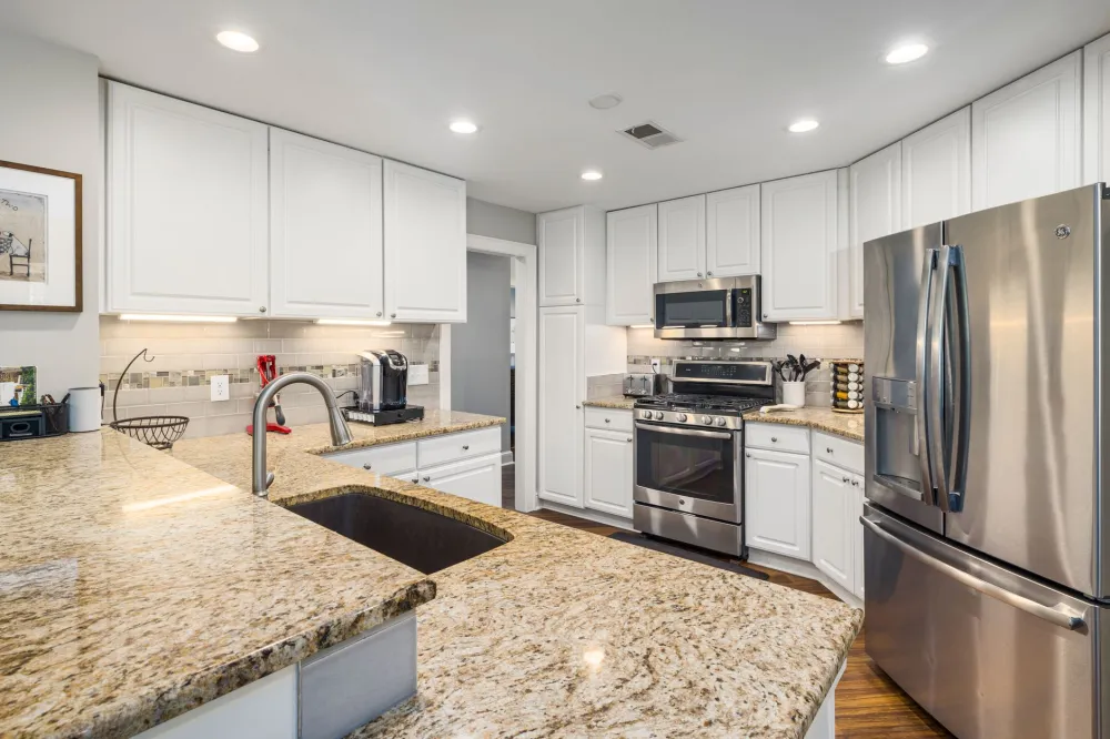 Updated kitchen cabinets and quartz countertops in a Bedford TX home for sale