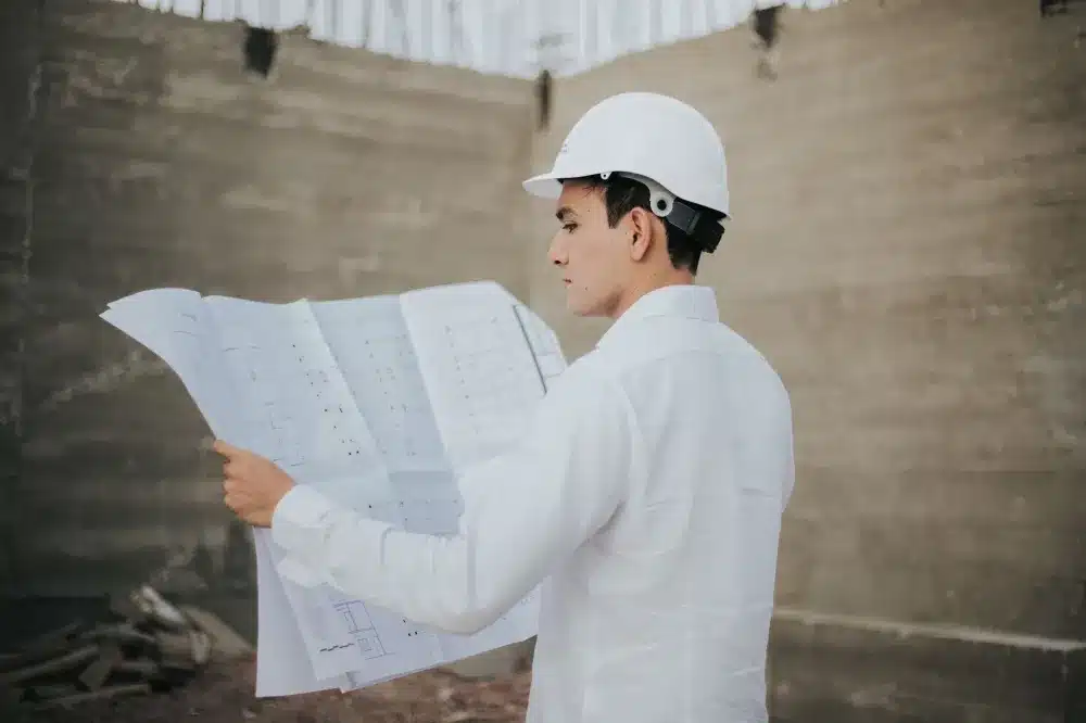Remodeling contractor reviewing flip property renovation plans in Hurst Texas