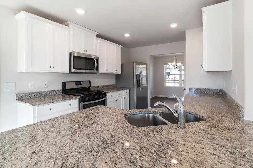 Updated kitchen cabinets and quartz countertops in an investment property remodel
