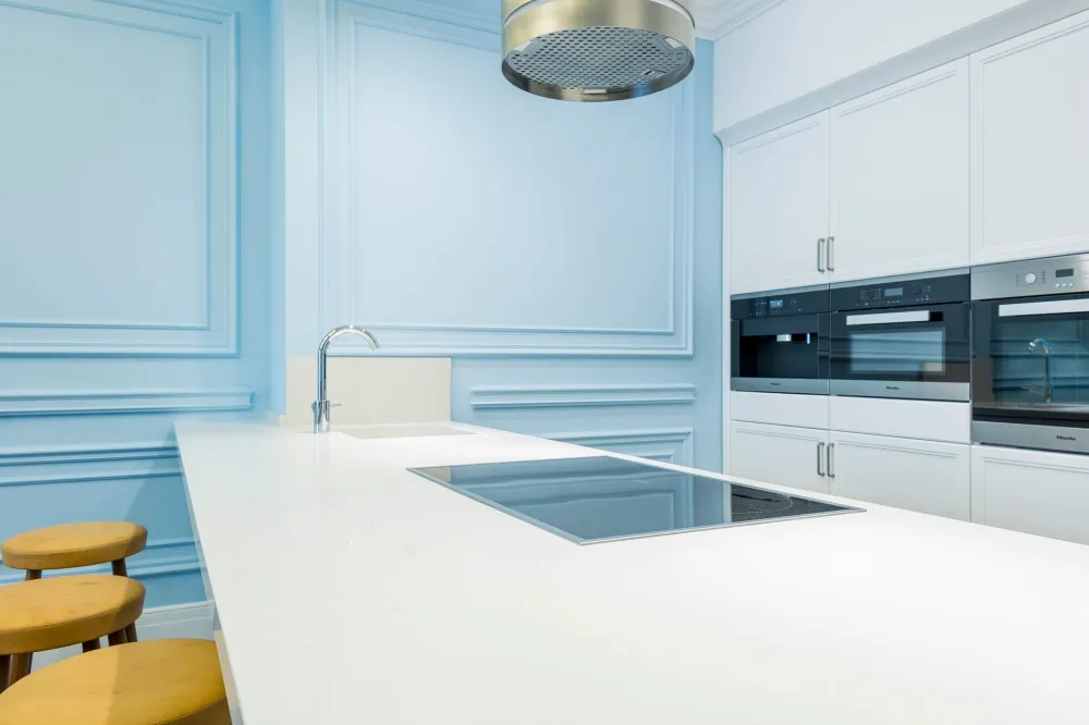 New quartz countertop with undermount sink in a renovated Arlington TX kitchen