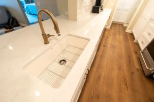 Bright open-concept kitchen remodel with white cabinets and quartz countertops in Arlington TX home