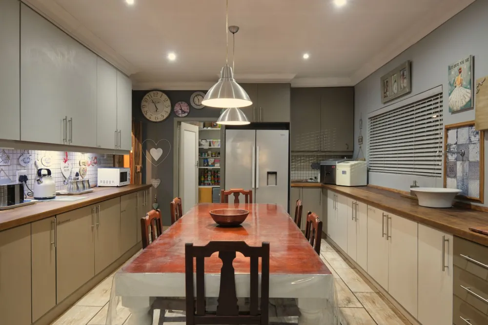 Completed kitchen renovation with modern finishes and recessed lighting in a DFW home