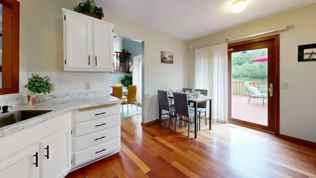 Bright open-concept kitchen remodel with quartz countertops and new cabinetry in Bedford TX home