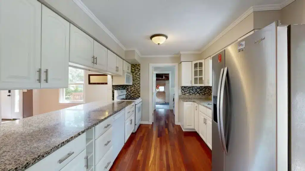 Freshly remodeled kitchen with new cabinets and quartz countertops in Arlington TX home